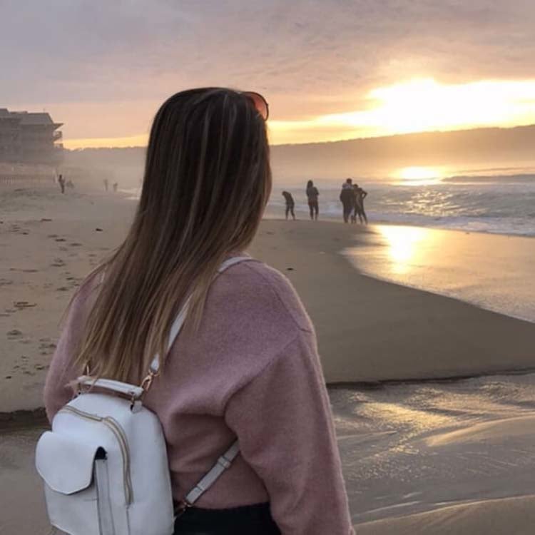 Student on the beach in california