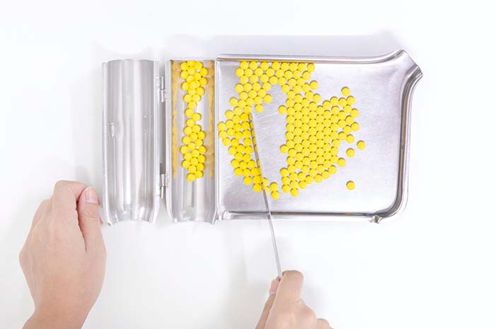 image of pills being sorted